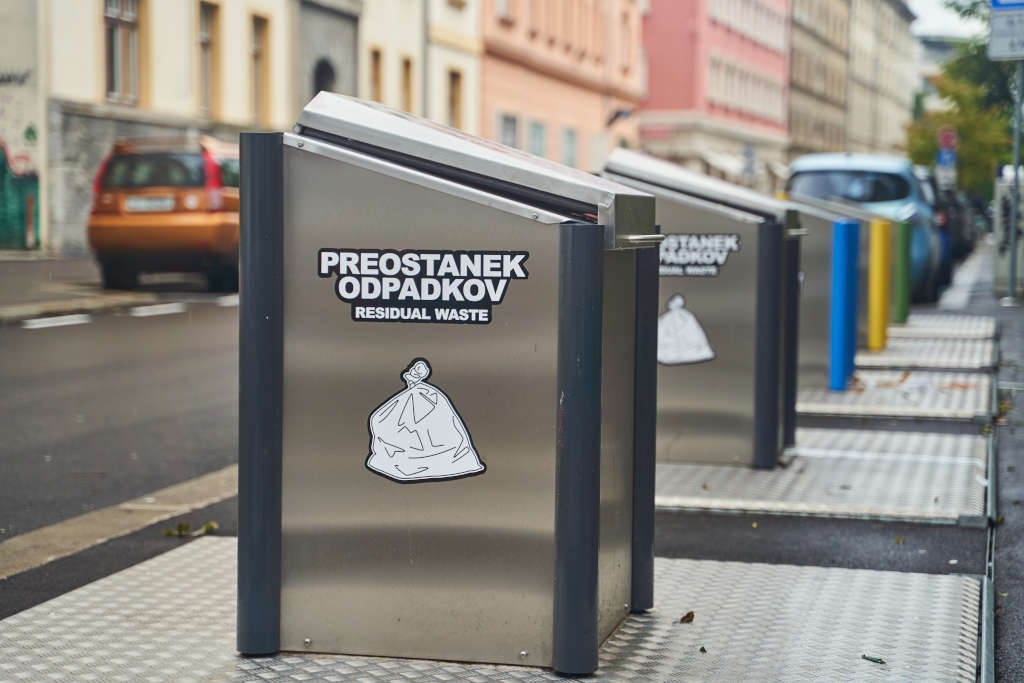 Ljubljana, Slovenia - October 10, 2022: Containers for separate garbage collection with lettering residual waste on the streets of Ljubljana. High quality photo