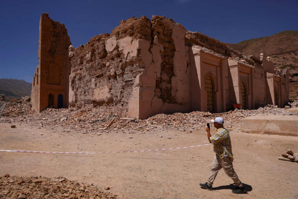 A man walks near Tinmel Mosque, which was damaged by the deadly earthquake, in Tinmel, Morocco, September 11, 2023. REUTERS/Hannah McKay TPX IMAGES OF THE DAY - RC2C63A0E810