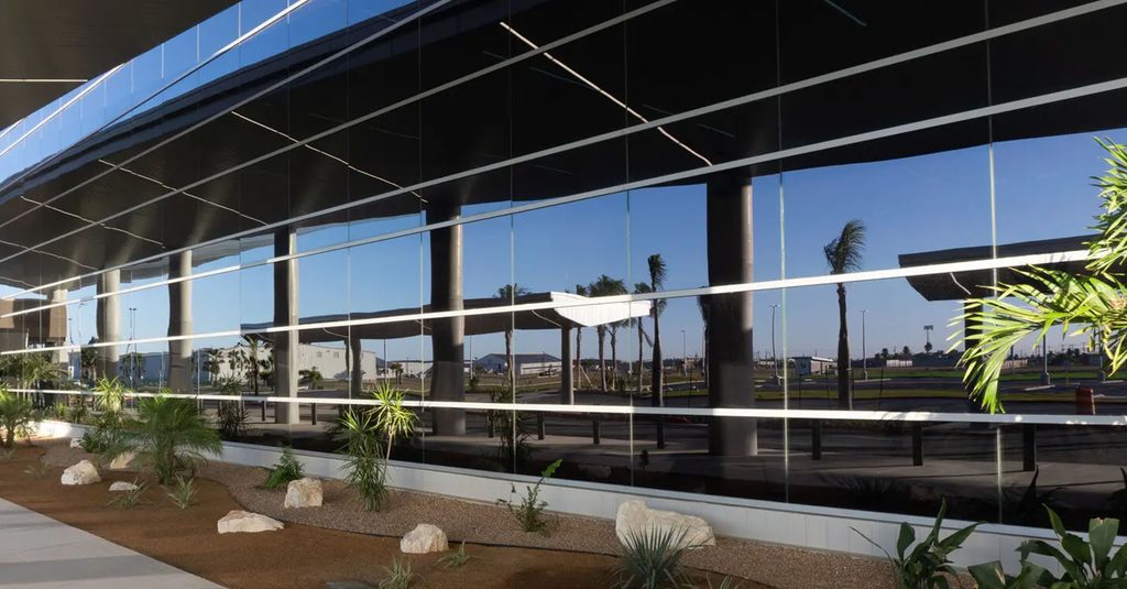 Electrochromic glazing installed at Brownsville airport to dynamically control daylight and solar heat gain.
